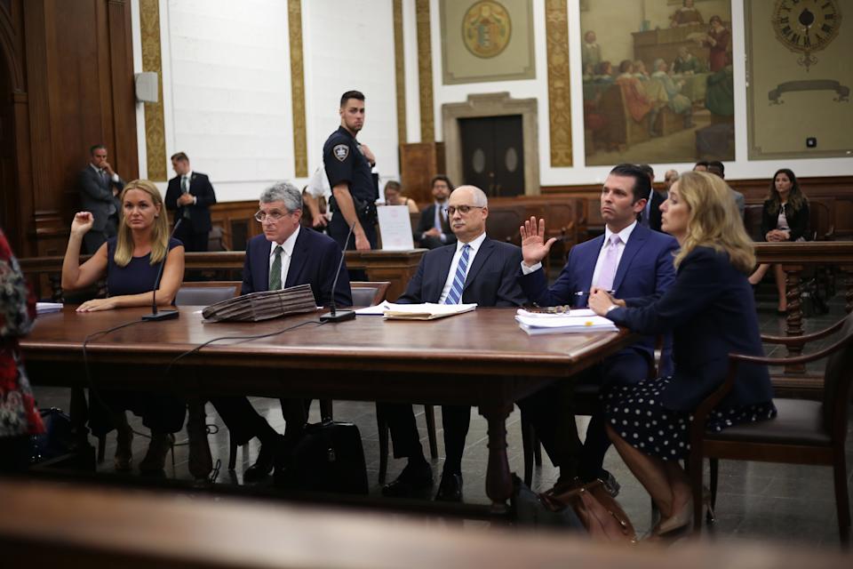 Donald Trump, Jr. (2nd-R) and Vanessa Haydon Trump (L) appear in Civil Supreme Court on July 26, 2018 in New York City. Donald Trump Jr. and his estranged wife Vanessa Trump appeared in court Thursday for the first hearing in their divorce proceeding