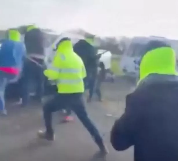 A man in a hi viz jacket 