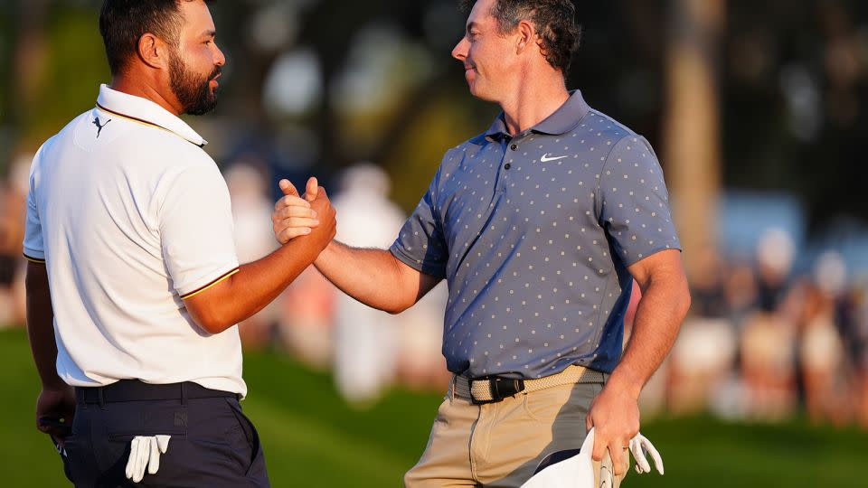McIlroy and Spaun embraced each other following Saturday's third round of The Players Championship. - Brian Spurlock/Icon Sportswire/AP