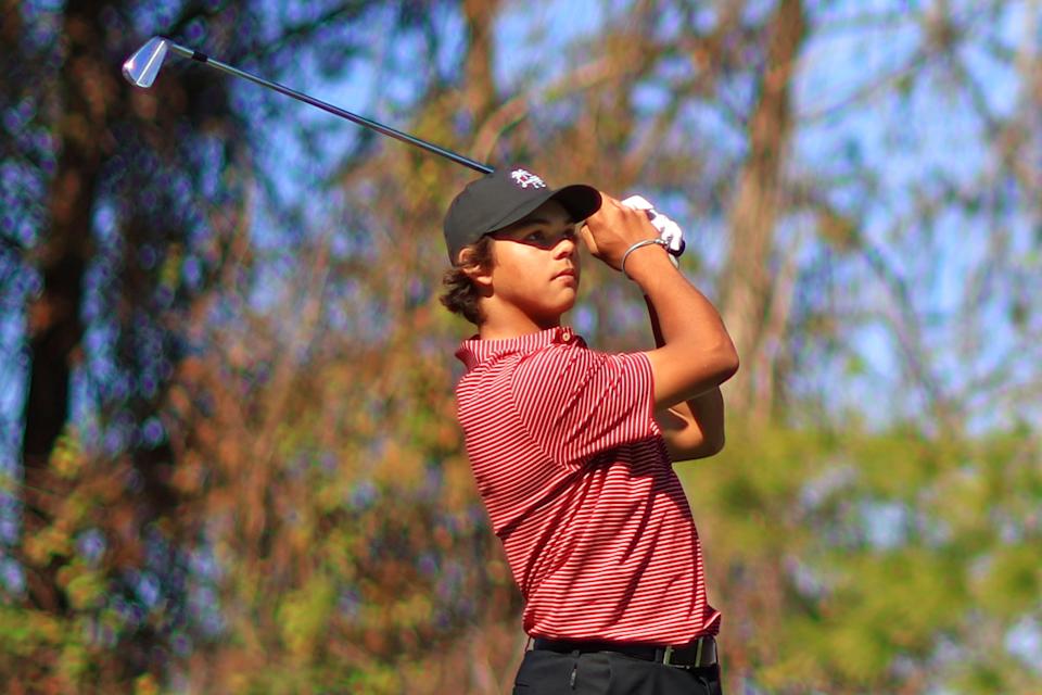 ORLANDO, FLORIDA - DECEMBER 22: Charlie Woods of the United States plays his shot from the fourth tee during the second round of the PNC Championship at Ritz-Carlton Golf Club on December 22, 2024 in Orlando, Florida. (Photo by Mike Ehrmann/Getty Images)