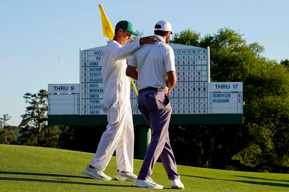 Scottie Scheffler walks with his caddie, Ted Scott, on No. 18 during the third round of the 2024 Masters Tournament. (Photo: Katie Goodale-USA TODAY Network)