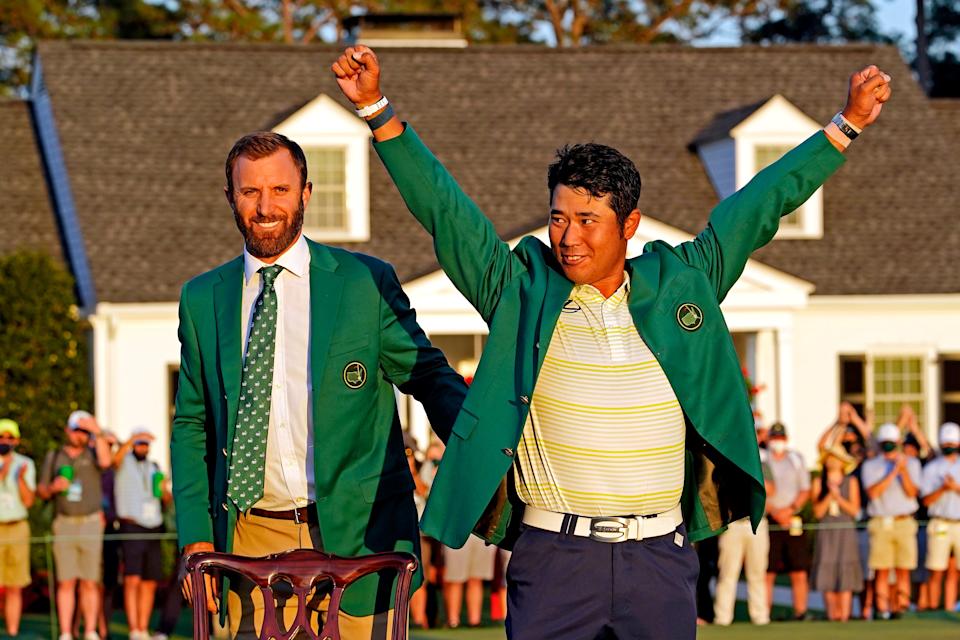 Dustin Johnson presents Hideki Matsuyama with the green jacket after winning the 2021 Masters. (Photo: Rob Schumacher-USA TODAY Sports)