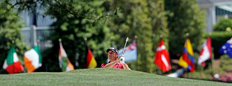 Lee Westwood hits a shot out of a bunker on the first hole during the final round of the 2011 Masters Tournament in Augusta, Georgia. Photo by Getty Images