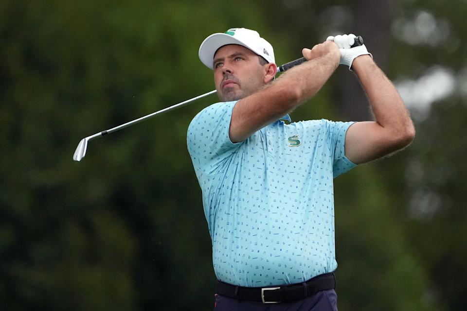 Charl Schwartzel plays his shot from the fourth tee during the first round of the Masters Tournament.