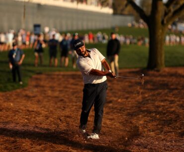 J.J. Spaun takes lead at Players on windy day that wrecked rounds