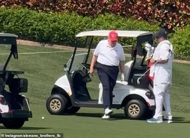 President Trump, in the now-viral footage, appeared to drag his right leg as he exited the golf cart, with many social media users now alleging his legs appeared to be 'far from stable', 'wobbly' and 'pigeon-toed'