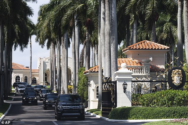 Trump's motorcade leaves Trump International Golf Club in West Palm Beach, Florida