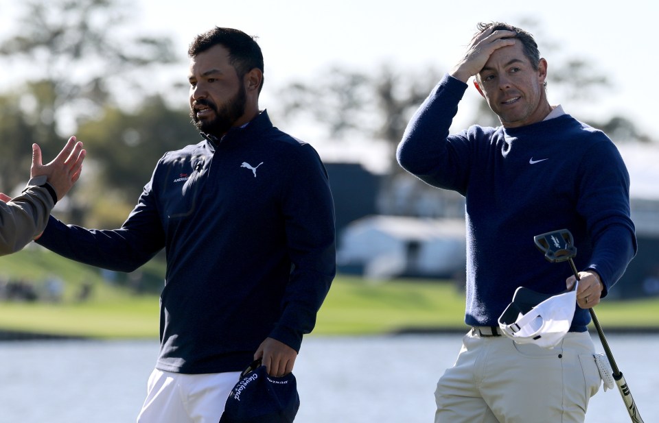 epa11969923 Rory McIlroy (R) of Northern Ireland celebrates after winning the playoff against J.J. Spaun (L) of the US for The Players Championship golf tournament at TPC Sawgrass in Ponte Vedra Beach, Florida, USA, 17 March 2025. EPA/ERIK S. LESSER