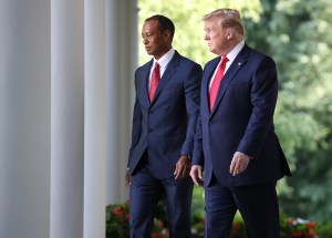 WASHINGTON, DC - MAY 06:  U.S. President Donald Trump walks to the Rose Garden with  professional golfer and business partner Tiger Woods before Woods was presented with the Medal of Freedom during a ceremony in the Rose Garden at the White House May 06, 2019 in Washington, DC. Trump announced he would give the nation’s highest civilian honor to Woods, 43, in honor of his Masters victory last month.  (Photo by Win McNamee/Getty Images)