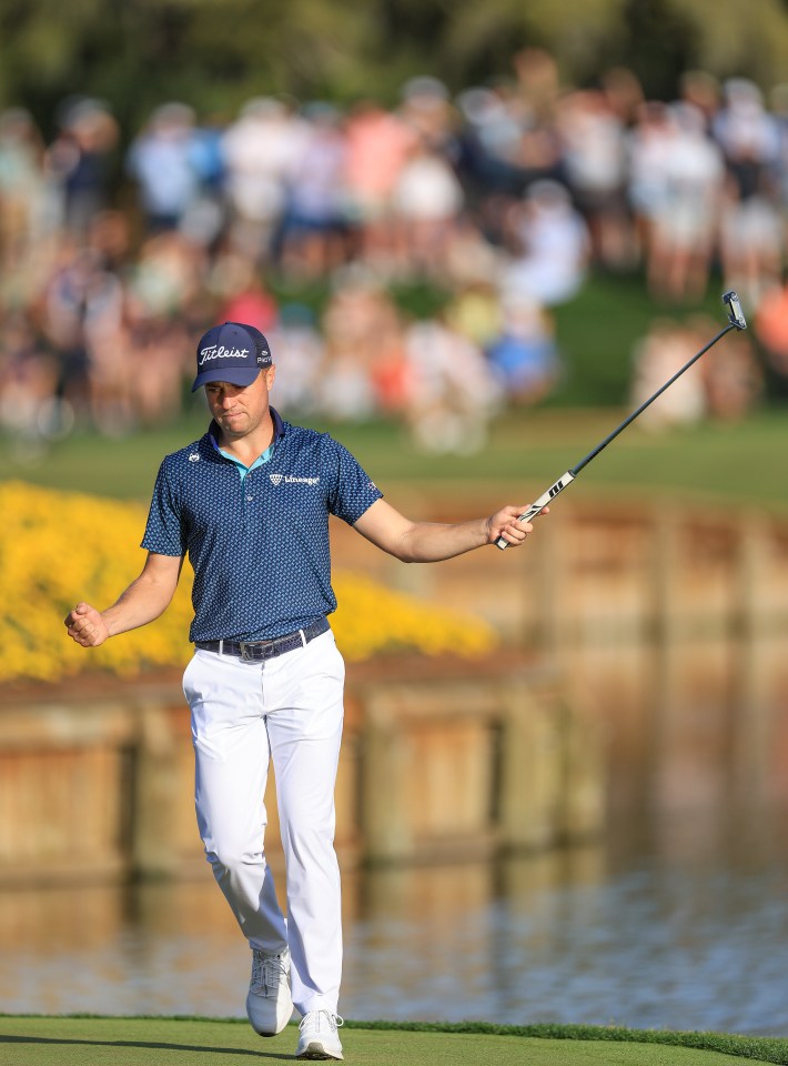 PONTE VEDRA BEACH, FLORIDA - MARCH 14: Justin Thomas of The United States celebrates after holing a birdie putt on the 17th hole during the second round of THE PLAYERS Championship 2025 at TPC Sawgrass on March 14, 2025 in Ponte Vedra Beach, Florida. (Photo by David Cannon/Getty Images)