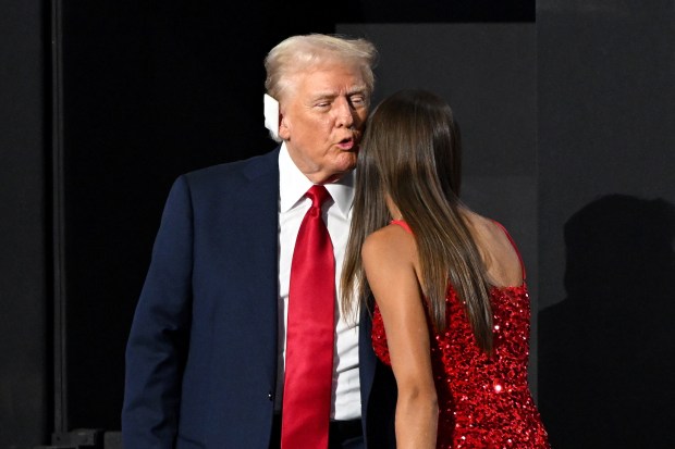 MILWAUKEE, WISCONSIN - JULY 18: Republican presidential candidate, former U.S. President Donald Trump greets daughter of Donald Trump Jr., Kai Trump, on the fourth day of the Republican National Convention at the Fiserv Forum on July 18, 2024 in Milwaukee, Wisconsin. Delegates, politicians, and the Republican faithful are in Milwaukee for the annual convention, concluding with former President Donald Trump accepting his party's presidential nomination. The RNC takes place from July 15-18. (Photo by Leon Neal/Getty Images)