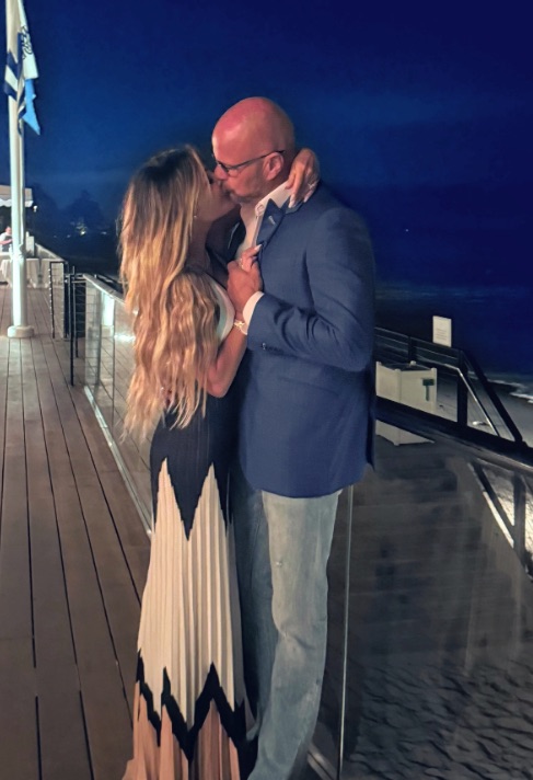 Couple kissing at night.