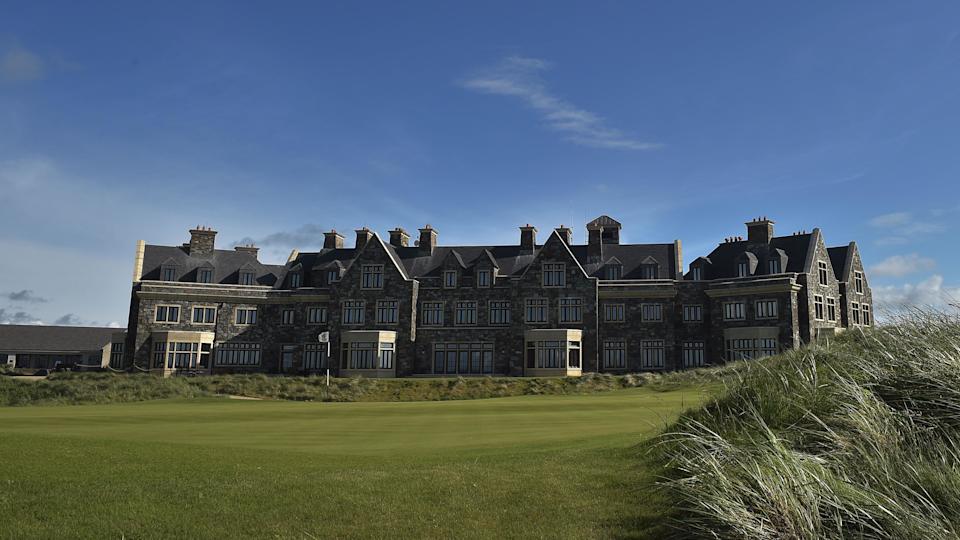 A still image of the golf house at the Trump International Golf Links Ireland site in Doonbeg County Clare. It is a stately, grey three-storey building and sits on the edge of the golf green.