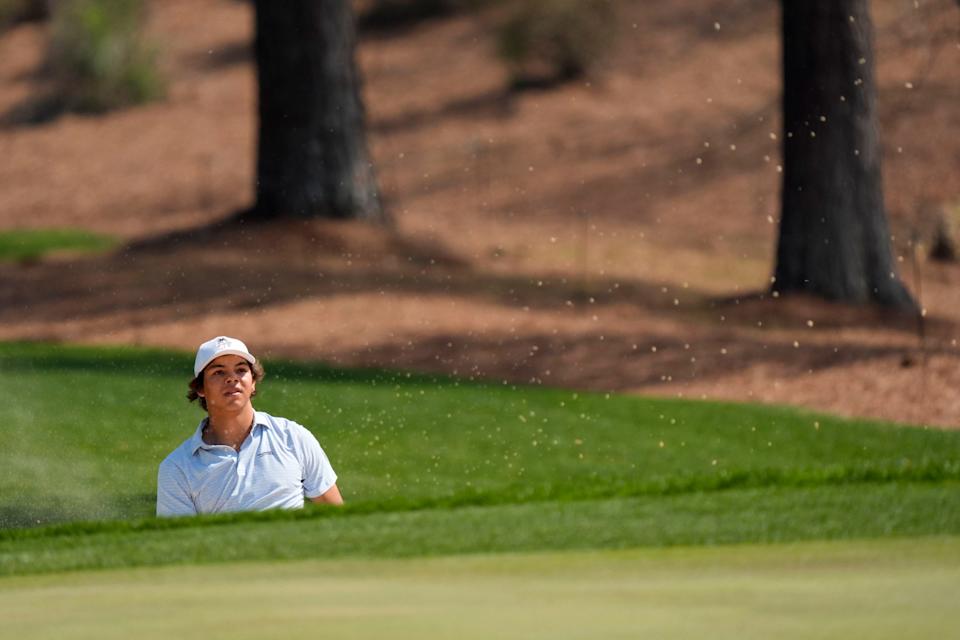 Mar 19, 2025; Graniteville, South Carolina, USA; Charlie Woods hits out of the bunker on No. 18 green during the first round of the Junior Invitational at Sage Valley Golf Club. Woods is the son of golf legend Tiger Woods and finished at +6. Mandatory Credit: Katie Goodale - Augusta Chronicle/USA TODAY NETWORK
