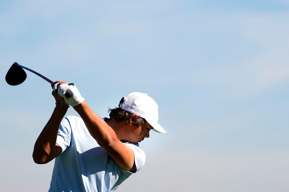 Mar 19, 2025; Graniteville, South Carolina, USA; Charlie Woods takes a practice swing as he prepares to tee off No. one during the first round of the Junior Invitational at Sage Valley Golf Club. Woods is the son of golf legend Tiger Woods and finished at +6. Mandatory Credit: Katie Goodale - Augusta Chronicle/USA TODAY NETWORK