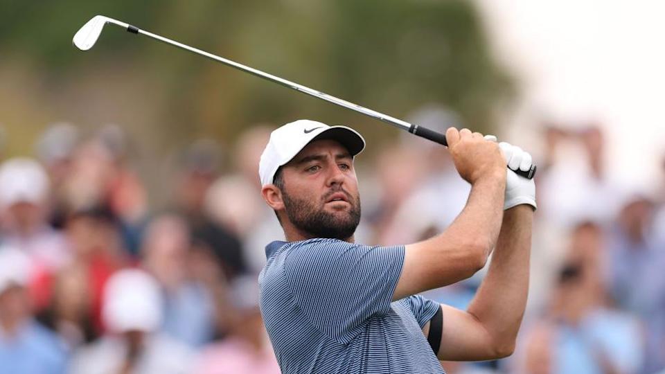Scottie Scheffler takes a shot at a tournament