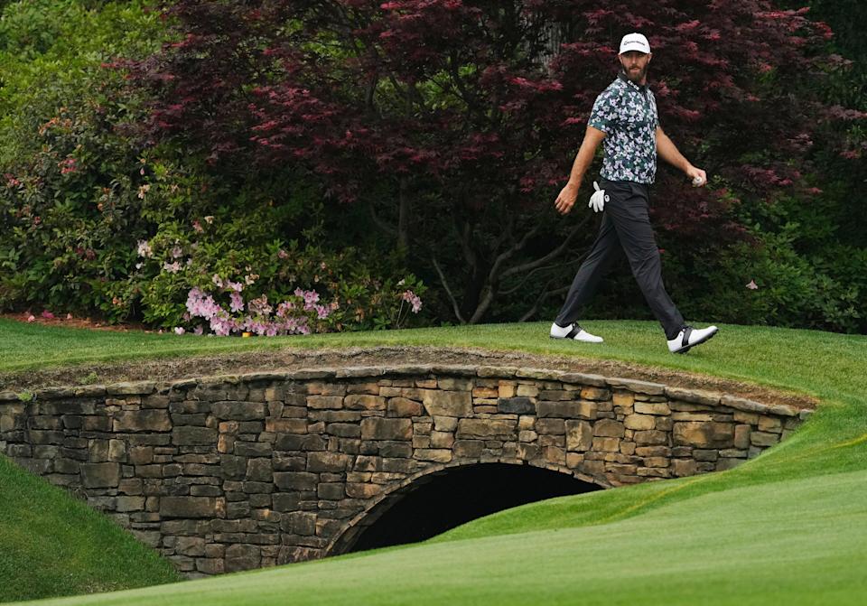 Dustin Johnson walks to the no. 13 green during a practice round for The Masters golf tournament at Augusta National Golf Club. Mandatory Credit: Michael Madrid-USA TODAY Network