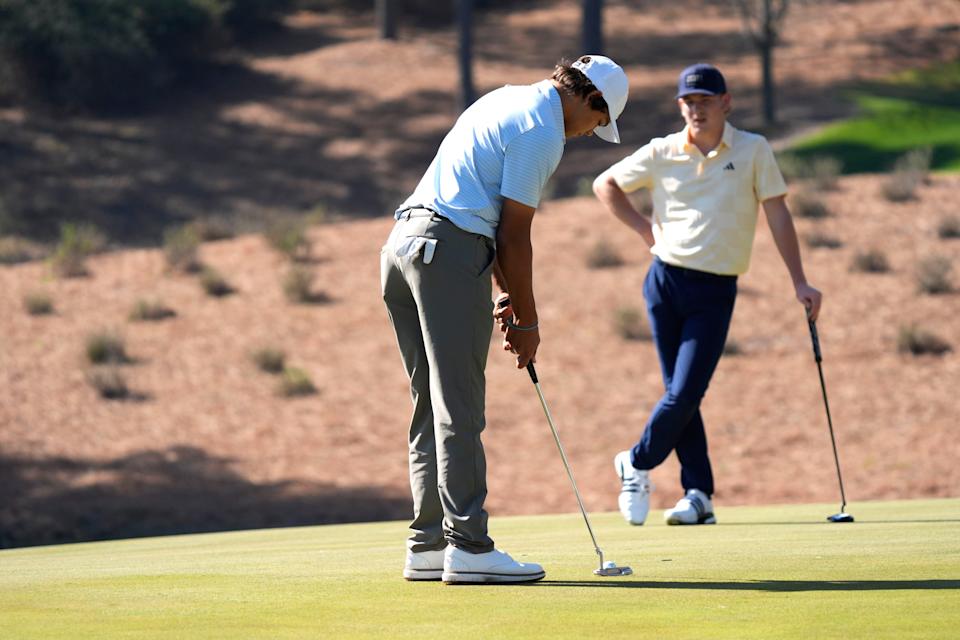 Mar 19, 2025; Graniteville, South Carolina, USA; Charlie Woods putts on No. two green during the first round of the Junior Invitational at Sage Valley Golf Club. Woods is the son of golf legend Tiger Woods and finished at +6. Mandatory Credit: Katie Goodale - Augusta Chronicle/USA TODAY NETWORK