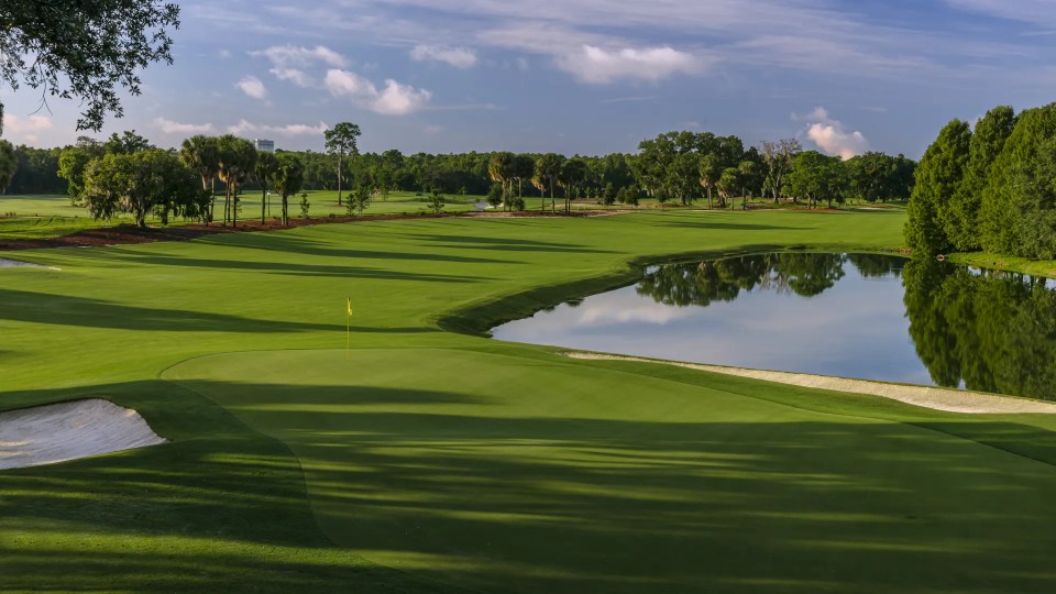 Golf course with a pond.