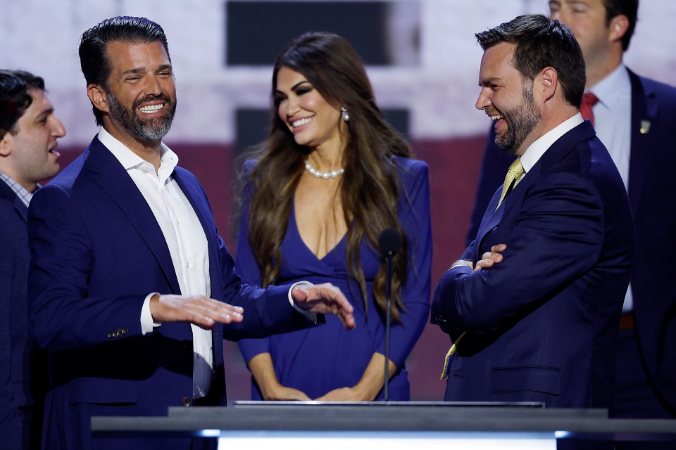 Donald Trump Jr. (left) with Kimberly Guilfoyle (center) and JD Vance (right) at the Republican National Convention in Milwaukee, Wisconsin, on July 16, 2024