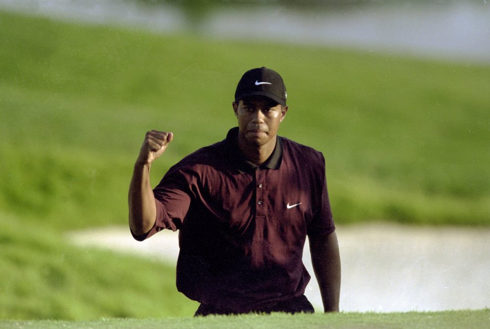 Many believe Woods' 2000 season was better than Scheffler's 2024
