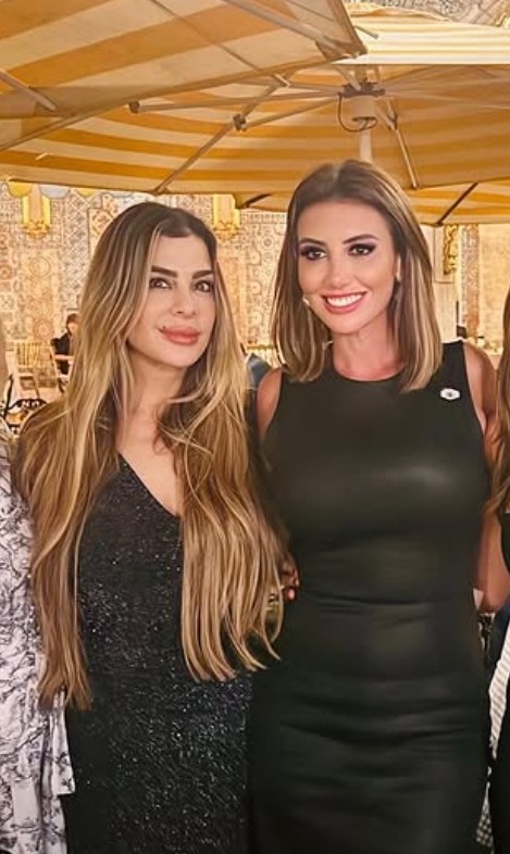 Photo of Alina Habba with two other women.