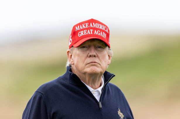 U.S. President Donald Trump plays golf at his Turnberry course, which has been damaged