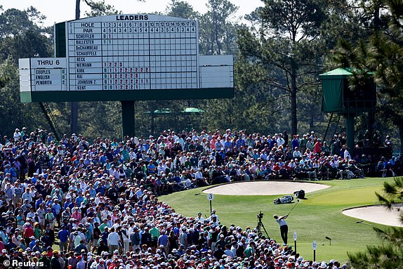Golf - The Masters - Augusta National Golf Club, Augusta, Georgia, U.S. - April 10, 2025 Scottie Scheffler of the U.S. hits his tee shot on the 3rd hole during the first round REUTERS/Mike Segar