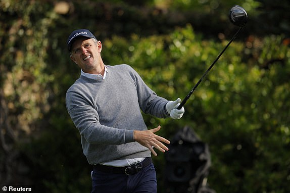 Golf - The Masters - Augusta National Golf Club, Augusta, Georgia, U.S. - April 11, 2025 England's Justin Rose hits his tee shot on the 2nd hole during the second round REUTERS/Mike Blake