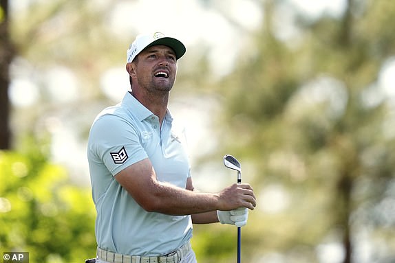 Bryson DeChambeau watches his tee shot on the fourth hole during the second round at the Masters golf tournament, Friday, April 11, 2025, in Augusta, Ga. (AP Photo/Julia Demaree Nikhinson)
