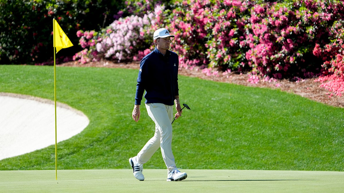 Nick Dunlap walks the course