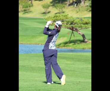 Hit the ball with the weight of the clubhead. She is Andrea Lee.