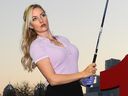 Paige Spiranac poses for photographs on Day One of the Omega Dubai Moonlight Classic in 2019.