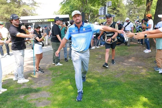 Bryson DeChambeau of Crushers GC greets fans on day one of LIV Golf Mexico City at Club de Golf Chapultepec on April 25, 2025 in Mexico City