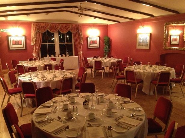 The restaurant in The Tweeddale Arms, with several circular tables set for dinner service