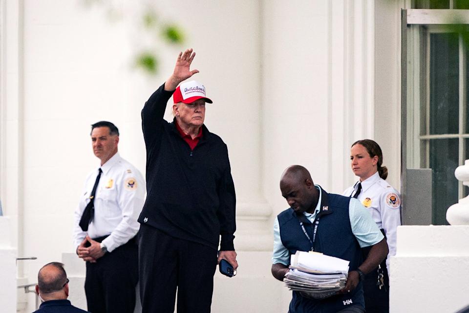 President Donald Trump waves as he leaves the White House to head to his Virginia golf course on Easter Sunday after a hate-filled Truth Social posting spree. / Getty Images