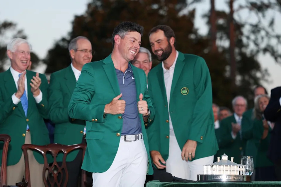 Rory McIlroy stands next to Scottie Scheffler after winning the Masters. Getty Images