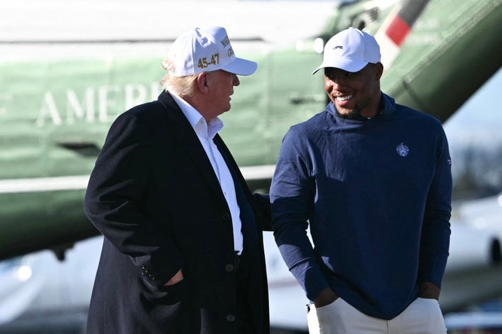 President Donald Trump photographed walking with Philadelphia Eagles running back Saquon Barkley on April 27, 2025. 
