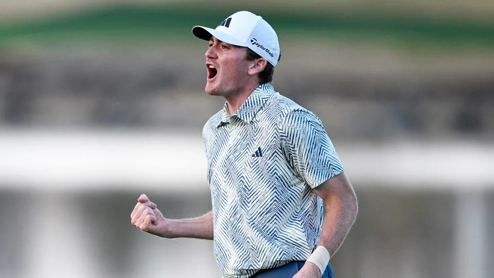 Nick Dunlap reacts to winning The American Express on the 18th green at Pete Dye Stadium Course on January 21, 2024. - Orlando Ramirez/Getty Images