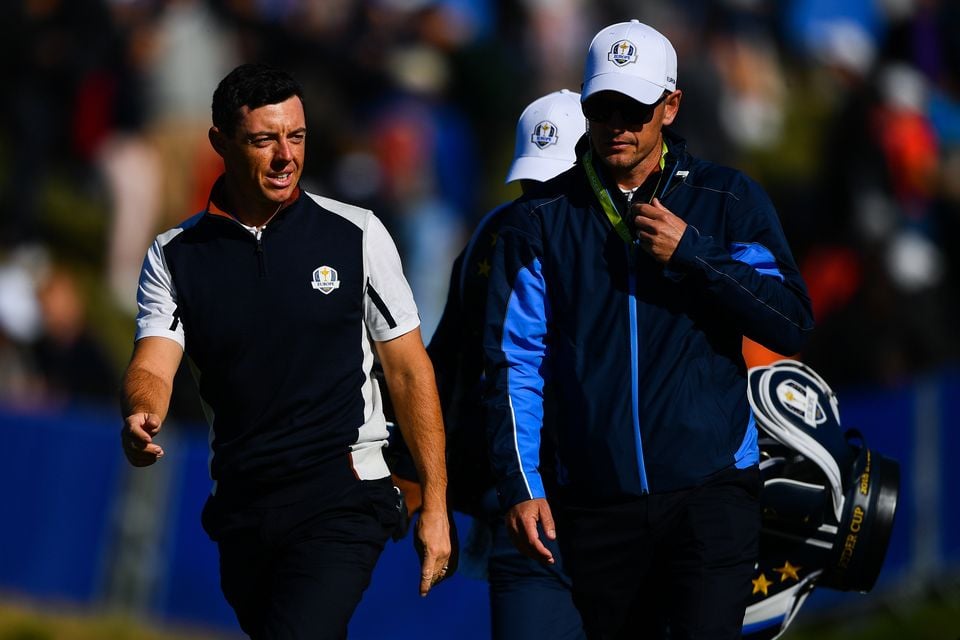 Rory McIlroy in conversation with Luke Donald at the 2018 Ryder Cup
