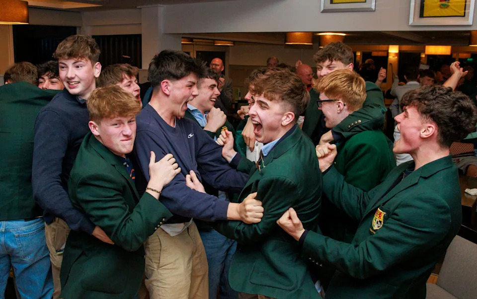 Sullivan Upper students wore their green blazers to watch McIlroy's victory at Augusta
