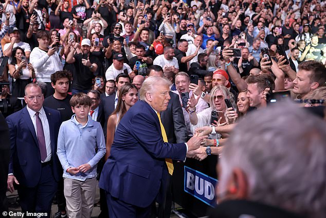 The president was flanked by his grandchildren, Kai, 17, Donald J. Trump III, 16, and Tristan, 13