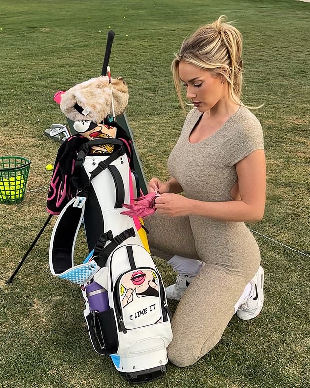 The snug grey bodysuit accentuated her features as she showed off her trademark swing