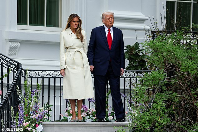 President Donald Trump and first lady Melania Trump walk to the South Lawn at Monday's White House Easter Egg Roll