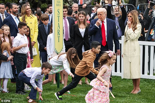 Don Jr - standing in the upper left with girlfriend Bettina (in the bright yellow Safiyaa coat) brought his children to the Easter Egg Roll: Kai Trump, Donald III, Tristan, Spencer and Chloe