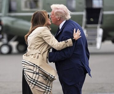 President Donald Trump kisses first lady Melania Trump before boarding Marine One