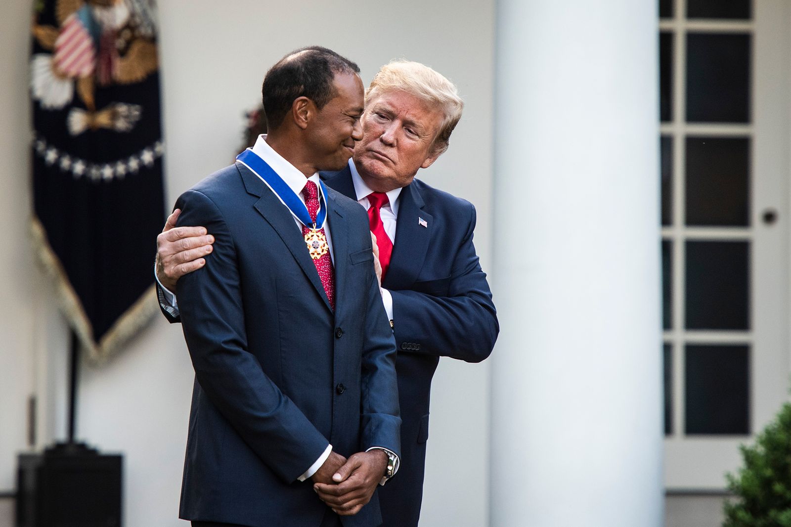 Image may contain Donald Trump Tiger Woods People Person Blazer Clothing Coat Jacket Accessories and Formal Wear