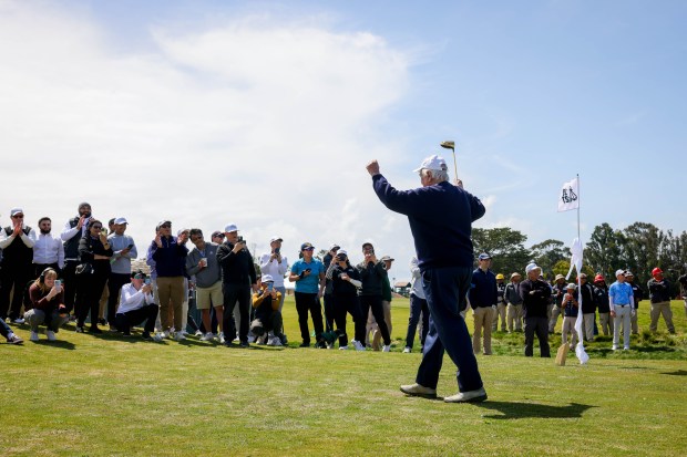 Internationally renowned golf architect Robert Trent Jones Jr. and golfers...