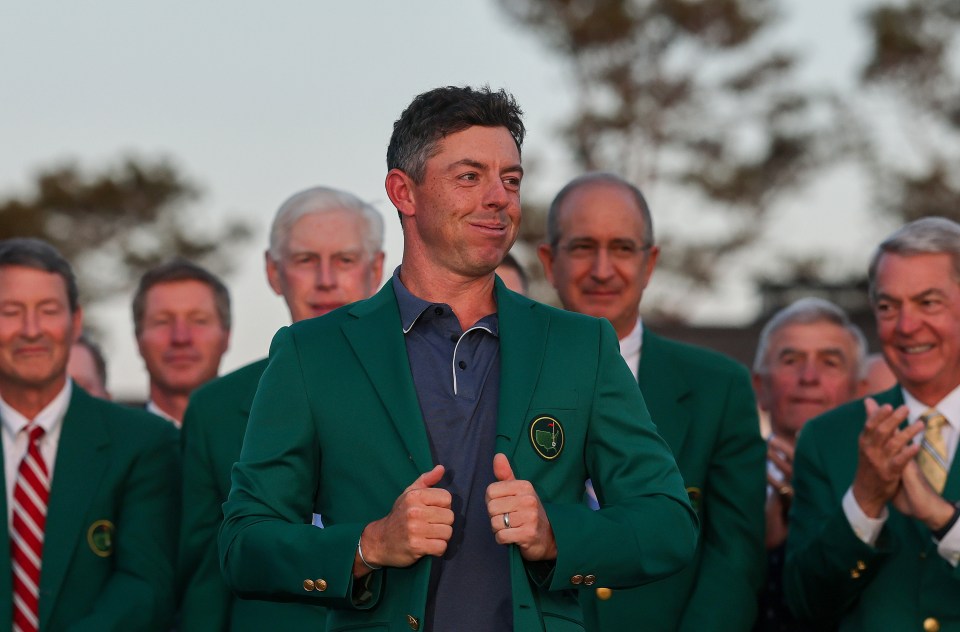 AUGUSTA, GEORGIA - APRIL 13: Rory McIlroy of Northern Ireland reacts as he puts on the Green Jacket during the ceremony after the 2025 Masters Tournament at Augusta National Golf Club on April 13, 2025 in Augusta, Georgia. (Photo by Michael Reaves/Getty Images)