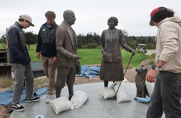 Statues of Alister MacKenzie, Marion Hollins and Carlos are readied...